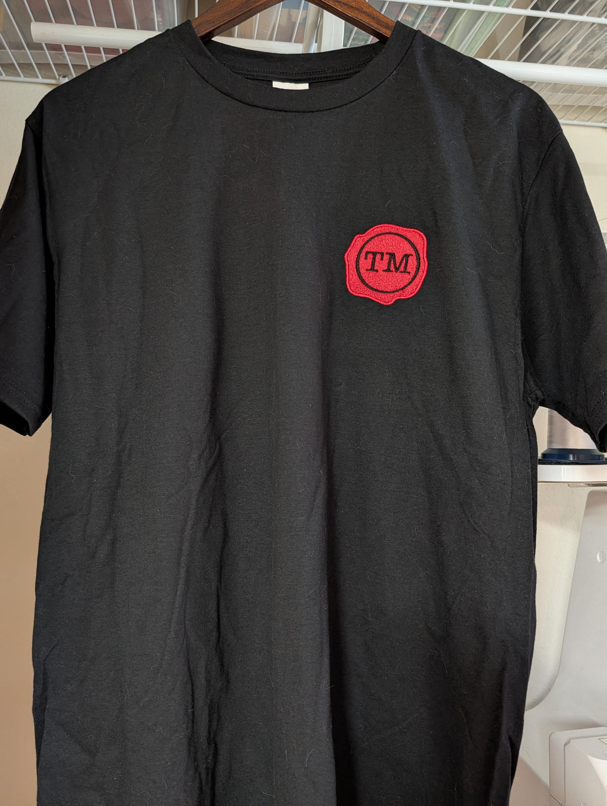 Taskmaster Wax Seal Embroidered Black T-Shirt | Classic Red Wax Seal Chest Embroidery | Unisex Cotton Tee